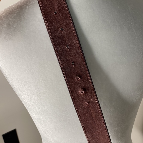 Leather belt with oval metal canvas embroidered buckle